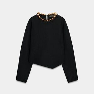 Elegant Black Top with Gold Accents